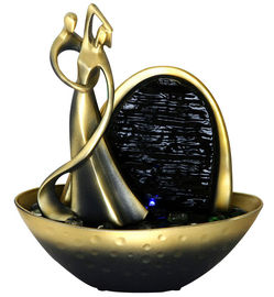 China Fuentes de agua decorativas de la sobremesa del color de oro en forma del bailarín proveedor